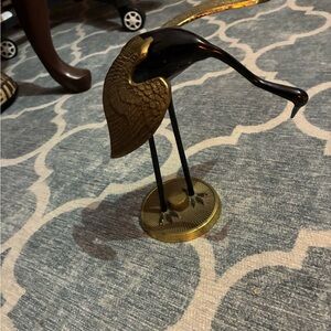 Elegant Black and Gold Crane Sculpture